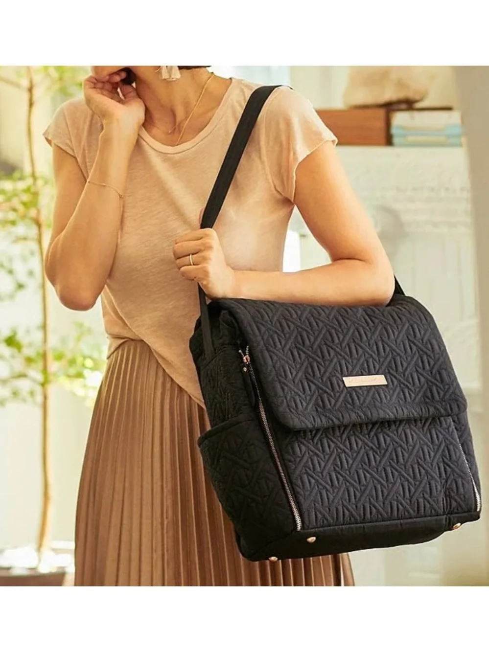 Petunia Pickle Bottom Black Quilted Backpack with Rose-Gold Accent - Diaper Bag